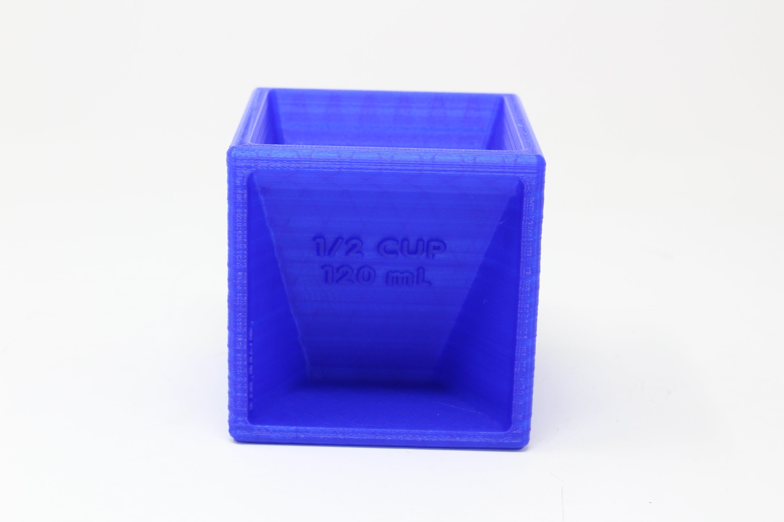 https://www.angled.io/cdn/shop/products/bakers-cube-dry-measuring-cups-in-a-single-cube-810193_2592x.jpg?v=1678826561