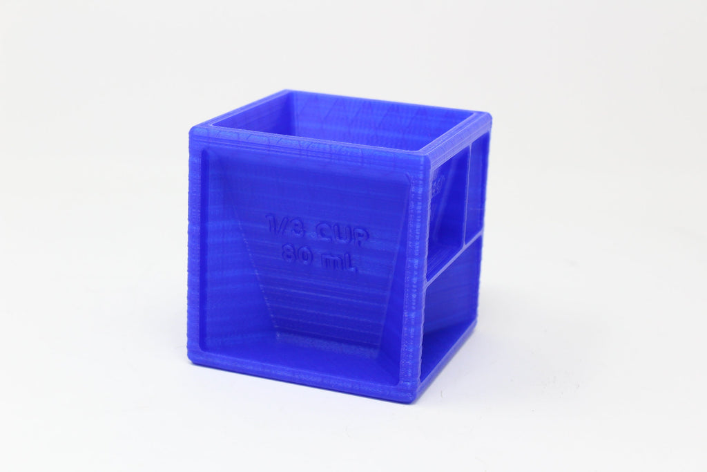 https://www.angled.io/cdn/shop/products/bakers-cube-dry-measuring-cups-in-a-single-cube-854018_1024x1024.jpg?v=1678826561